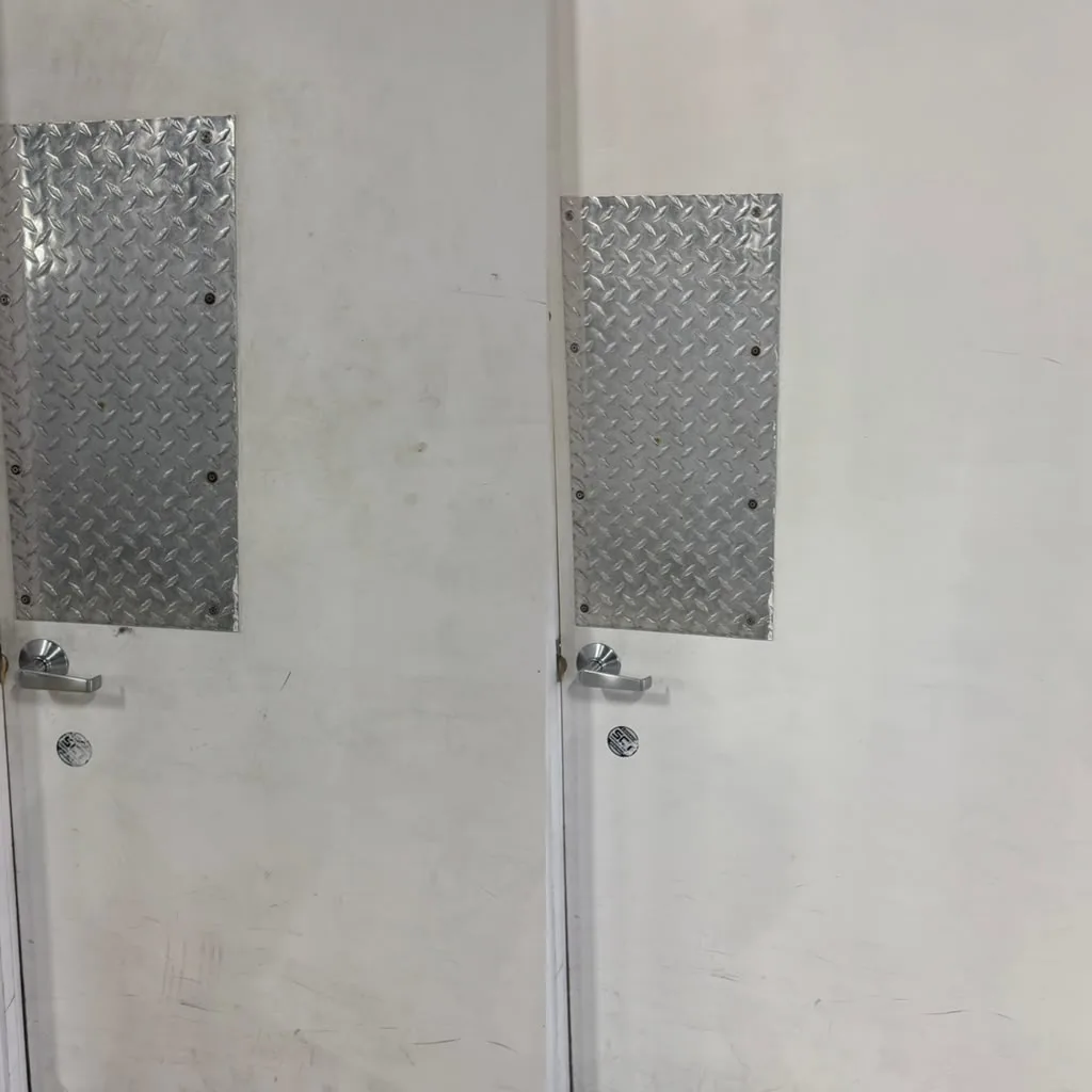 Before and after door kick plate cleaning by Empire Clean